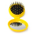 Foldable mirror with comb