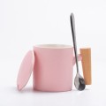 Ceramic mug with wooden handle