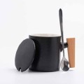 Ceramic mug with wooden handle