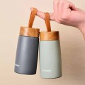 Portable wood grain lid thermos