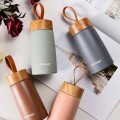 Portable wood grain lid thermos