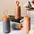 Portable wood grain lid thermos