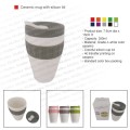Double wall ceramic mug with silicon lid and sleeve 